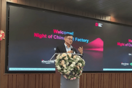 Tianwen Liu, iSoftStone's founder, chairman, and CEO standing behind a podium to deliver his keynote address at "Night of China's AI Factory" during NVIDIA GTC 2026.